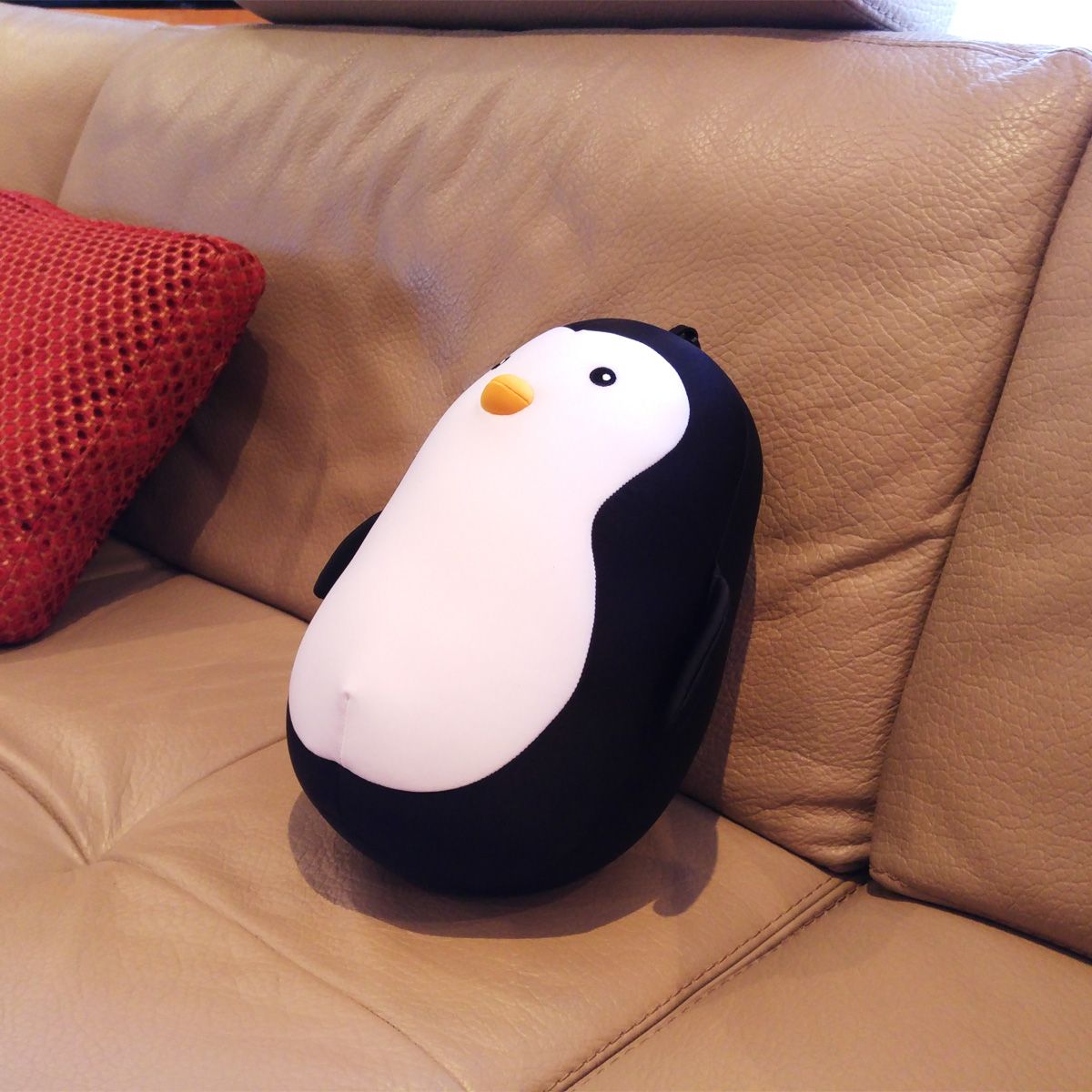 Cojín cervical pingüino