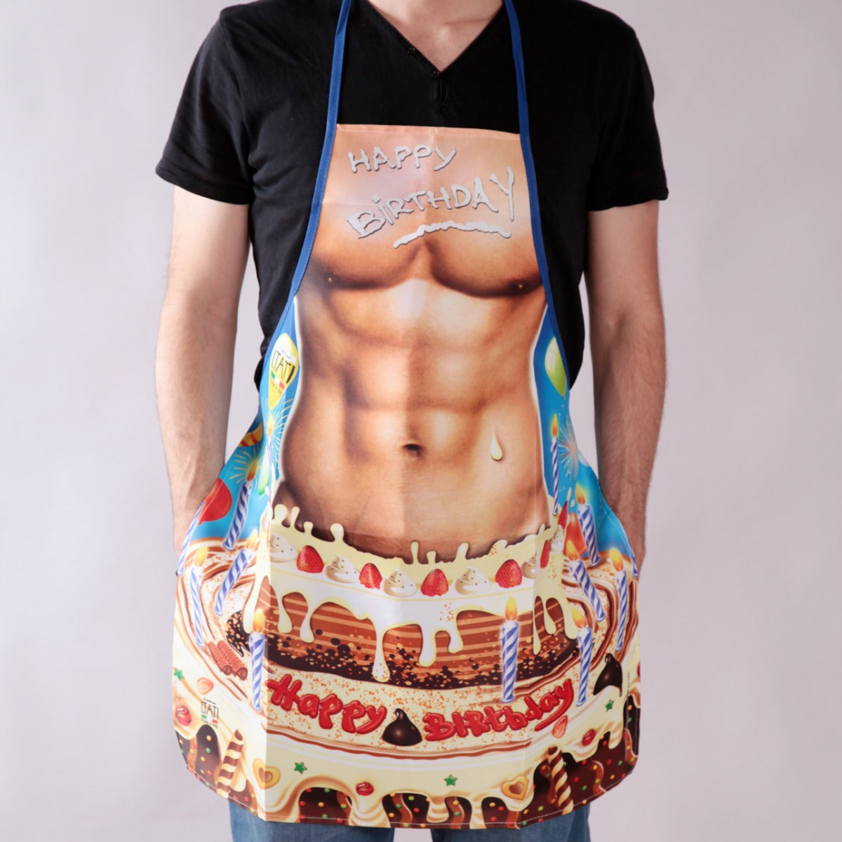 Delantal sexy hombre en tarta de cumpleaños