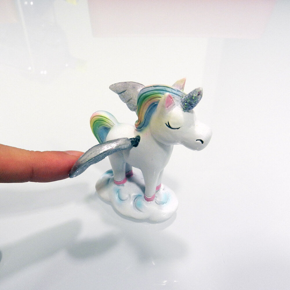 Figurita unicornio alas movimiento