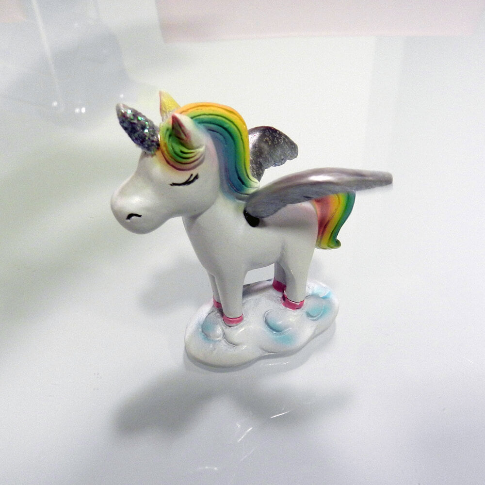 Figurita unicornio alas movimiento