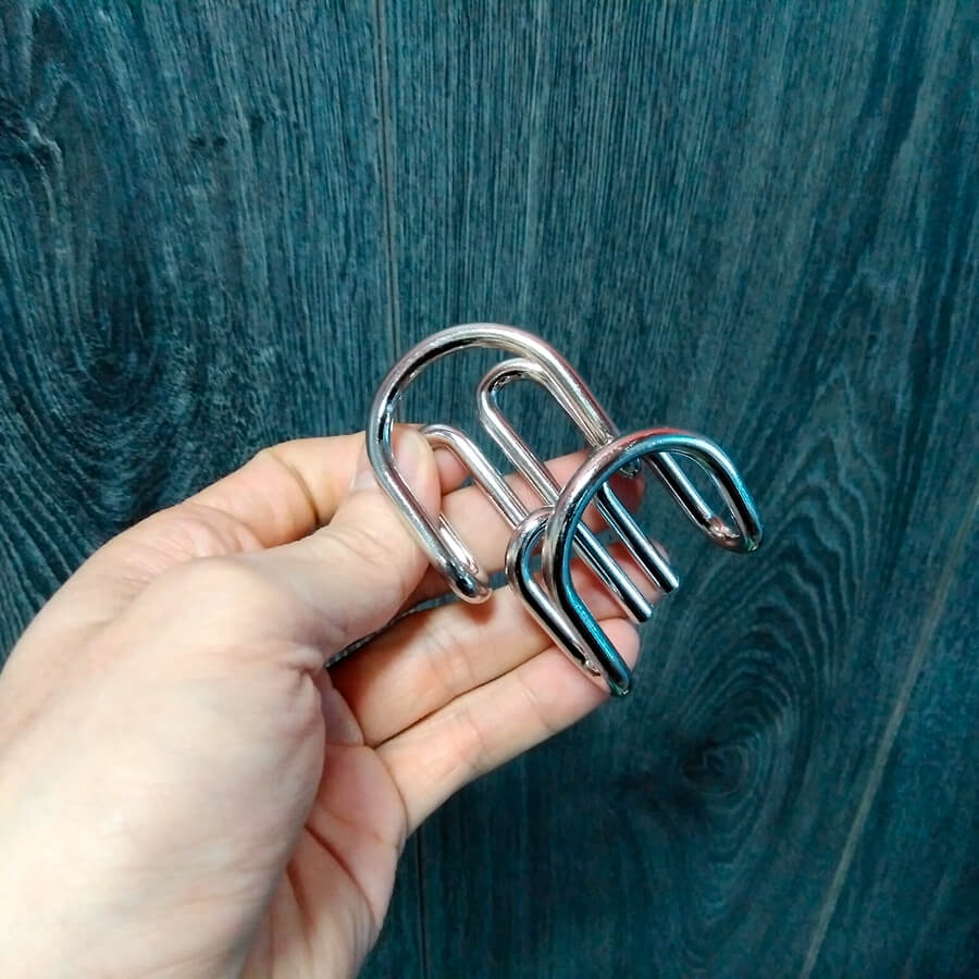 Puzzle de nudos de metal