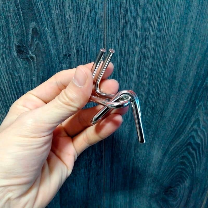 Puzzle de nudos de metal