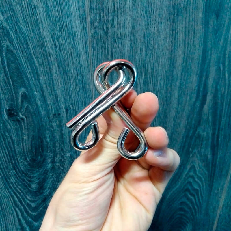Puzzle de nudos de metal
