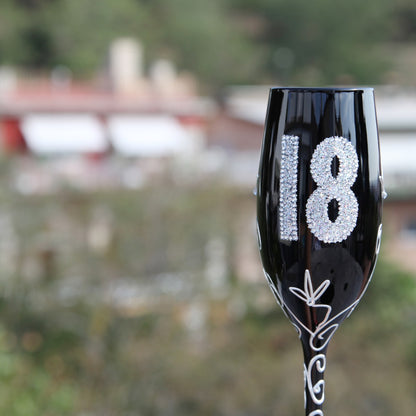 Copa de champagne color negro de 18 años