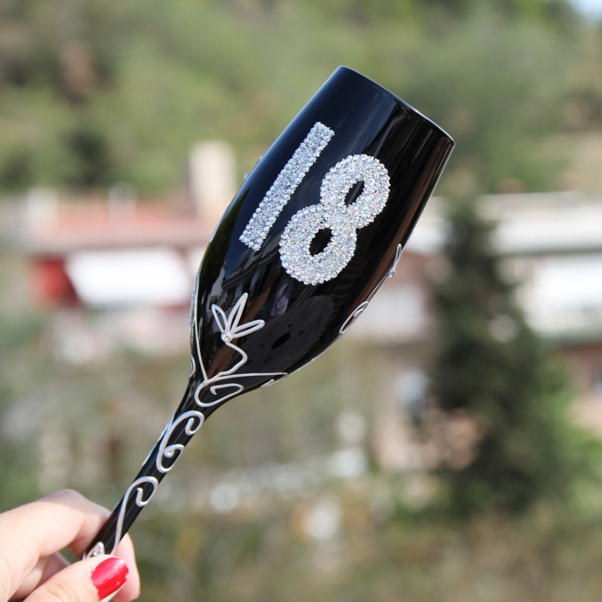 Copa de champagne color negro de 18 años