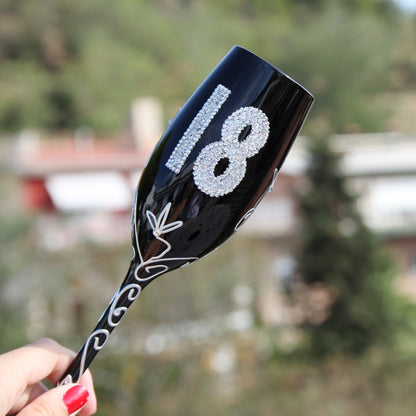 Copa de champagne color negro de 18 años