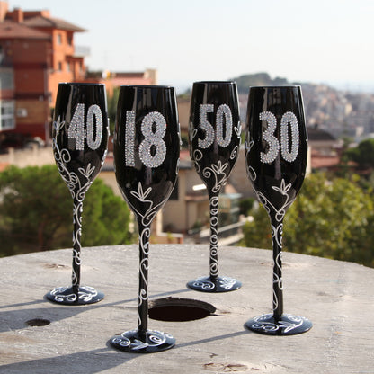 Copa de champagne color negro de 40 años