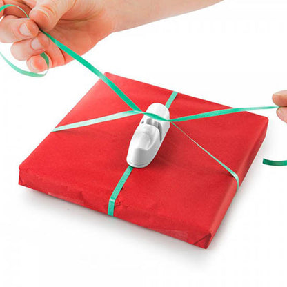 Dedo mágico para envolver regalos